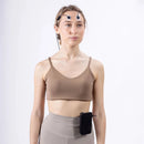 Researcher wearing the EEG Smart Sensor with the Biosignals PRO hub at the waist